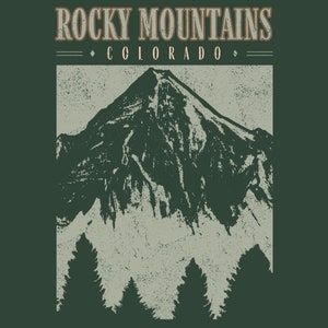 May include: A vintage-style graphic design featuring a mountain range with the text "ROCKY MOUNTAINS COLORADO" in a brown font.