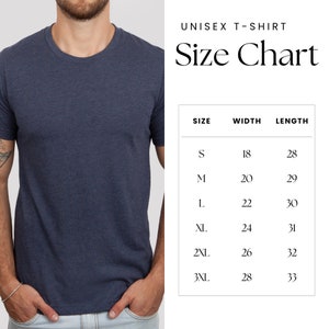 May include: A navy blue unisex t-shirt with a crew neck. The image includes a size chart with measurements in inches: S (18" width, 28" length), M (20" width, 29" length), L (22" width, 30" length), XL (24" width, 31" length), 2XL (26" width, 32" length), and 3XL (28" width, 33" length).