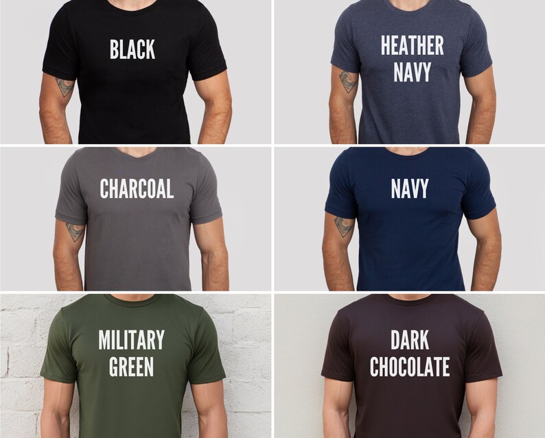 May include: A collection of six short-sleeved t-shirts in various colors: black, heather navy, charcoal, navy, military green, and dark chocolate. Each shirt displays its color name in bold, white capital letters.