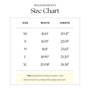 May include: Size chart for a shirt with measurements in inches for width and length. Sizes include XS, S, M, L, and XL.  *Not standard women's sizes-runs extra small for a fitted 90s baby tee look.