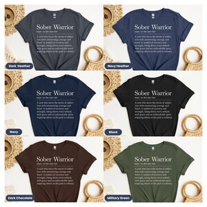 May include: A set of ten t-shirts in various colors, each featuring the text "Sober Warrior" with a definition of the term. The definition reads: "A soul who faces the storm of addiction with unwavering courage and heart. A symbol of recovery and strength, rising above every setback with grace and an unbreakable spirit, inspiring others on the path to sobriety."