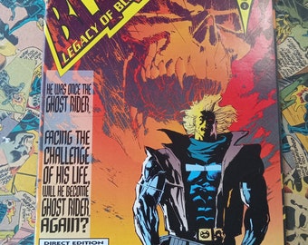 May include: A comic book cover featuring a character with a skull-like face and a man holding a gun. The comic book is titled "Blaze: Legacy of Blood: 3 of 4" and is part of the Marvel Midnight Sons series. The cover is a mix of red, yellow, and blue colors.