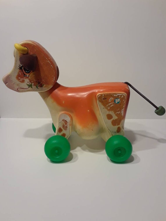 fisher price cow pull toy