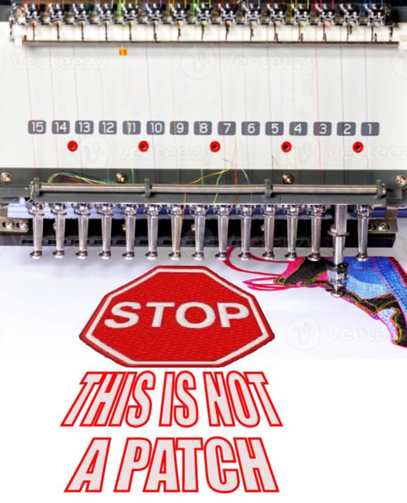 May include: A red stop sign with white lettering is being embroidered on a white fabric. The text "THIS IS NOT A PATCH" is below the stop sign.