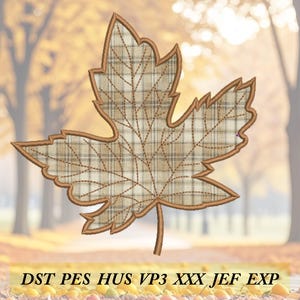 May include: A decorative leaf design with a plaid pattern in shades of brown and tan, outlined in a darker brown. The leaf features detailed stitching and the text "DST PES HUS VP3 XXX JEF EXP" at the bottom.