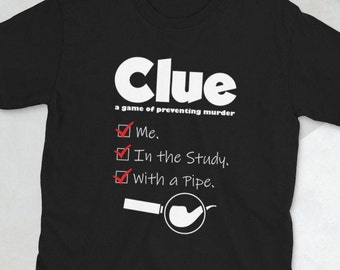 May include: Black t-shirt with white text that reads "Clue: a game of preventing murder". A checklist with three items is ticked off: "Me", "In the Study", and "With a Pipe". A magnifying glass with a pipe inside is below the checklist.