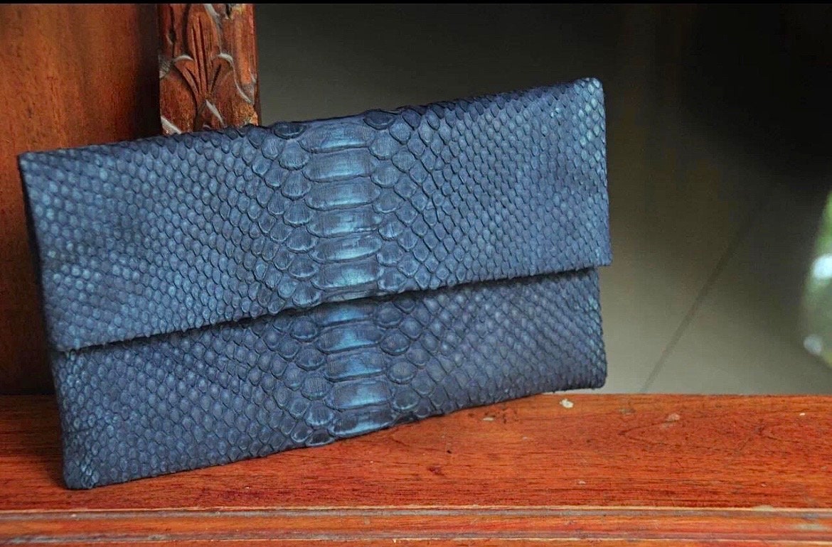 Blue snakeskin clutch deals