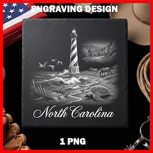 May include: A square black slate coaster featuring a white engraved design of a lighthouse, a sea turtle, a shipwreck, horses, and a coastal road. The text North Carolina is printed in white script at the bottom of the slate surface.