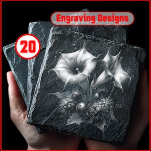 May include: A set of 20 engraved slate coasters. Each coaster features a detailed black and white botanical design of flowers and berries. The text "Engraving Designs" is displayed in a red banner.