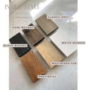 May include: Wood stain color samples in various shades of brown, gray, and white. The samples are labeled with the following names: Dark Walnut, Black Washed, Provincial, Weathered Oak, Classic Grey, and White Washed.
