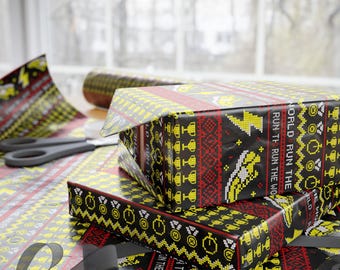 May include: Wrapping paper featuring a black background with a repeating pixelated pattern in yellow and red. The design includes yellow lightning bolts, trophies, medals, and stopwatches, with the text RUN THE WORLD printed in white.