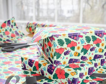 May include: Wrapping paper featuring a repeating pattern on a light green background. The design includes purple boba tea cups with smiling faces, bright pink hibiscus flowers, green tropical leaves, yellow suns, and small pineapples.