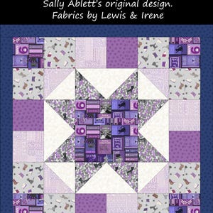May include: A patchwork bag with a starburst pattern, featuring a navy blue border and a central design of books, cats, and the text "The Purrfect Book Club". The design incorporates white, purple, and grey fabrics.
