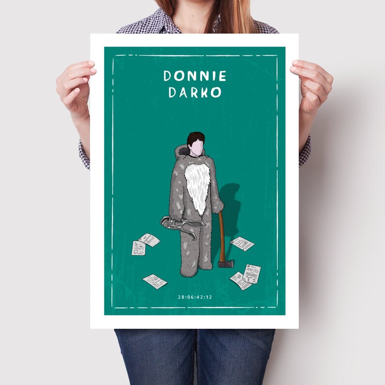 May include: A green poster with the text "Donnie Darko" in white. A cartoon illustration of a man in a gray bunny costume holding a shovel and a pair of scissors. The text "28:06:42:12" is at the bottom of the poster.
