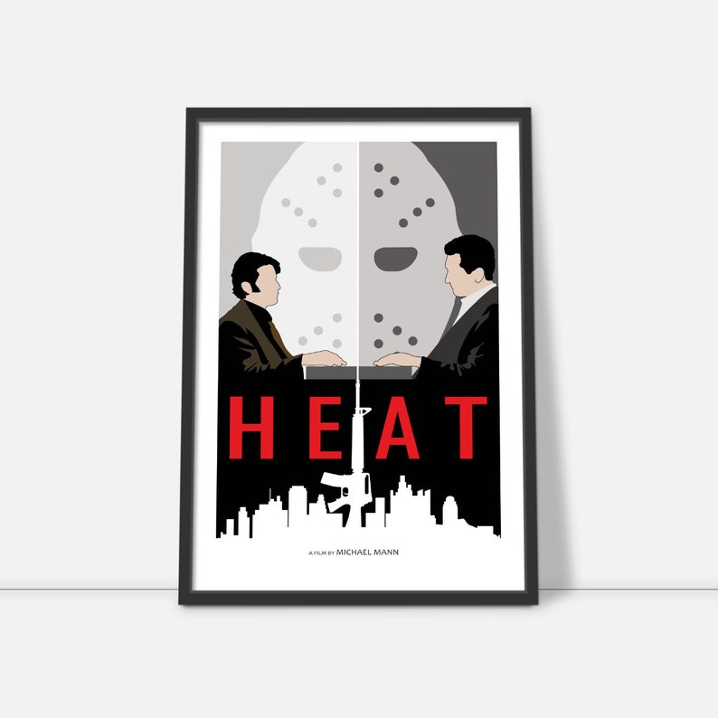 May include: A minimalist poster design for the film "HEAT" featuring a black and white image of two men facing each other with a hockey mask in the middle. The title "HEAT" is in red text and the words "A FILM BY MICHAEL MANN" are in white text at the bottom.