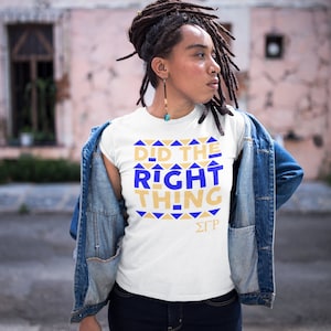May include: White t-shirt with a blue and gold design that says "Did the Right Thing" and "&Sigma;&Gamma;&Rho;".