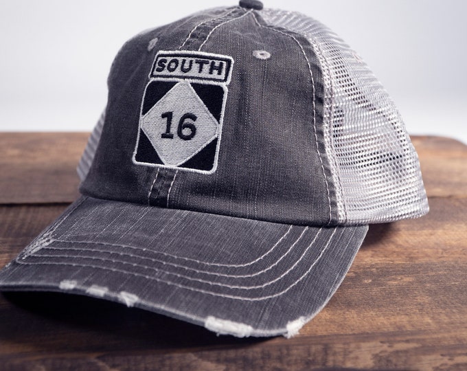 Highway 16 (where the road ends) Distressed Trucker Hat