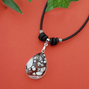 Unique and Stylish Pendant Necklace - Stainless Steel & Leather Cord - Etsy Shop