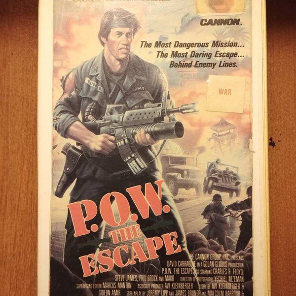 P.O.W. the Escape original 1987 release VHS tape Cannon Films Inc. Video City hard plastic VHS case David Carradine war action movie