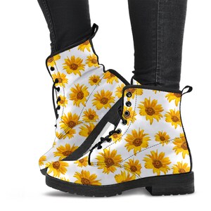 Vegan leather combat boots with custom artwork displayed from different angles and details