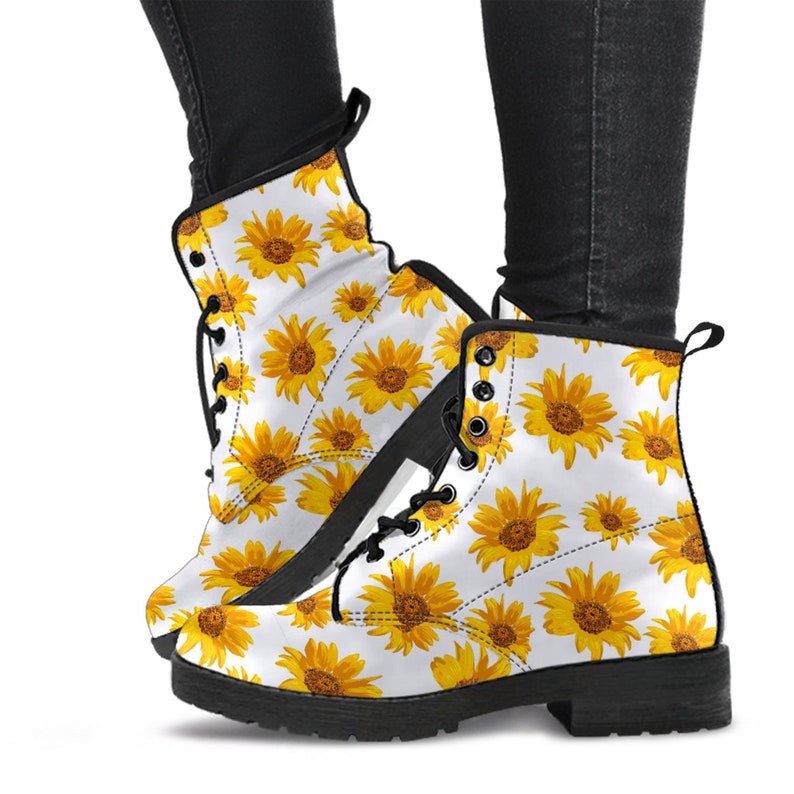 Vegan leather combat boots with custom artwork displayed from different angles and details
