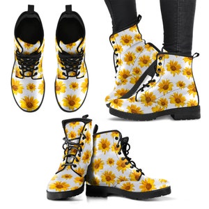 Pair of sunflower print boots with cheerful yellow flowers and green leaves artwork