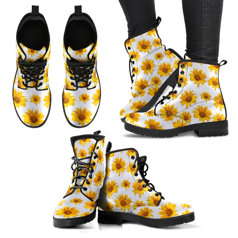 Pair of sunflower print boots with cheerful yellow flowers and green leaves artwork