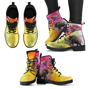May include: Yellow and black leather boots with a colourful floral and elephant design. The boots have laces and a round toe.