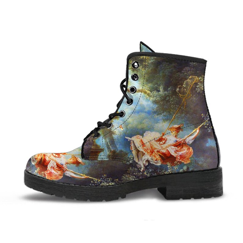 Back view of boots showing heel detail, back seaming, and upper shaft design elements