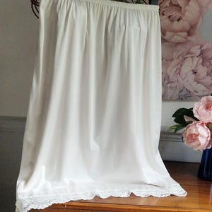 Ivory half slip edged in lace with elasticated waist, vintage slip, 60s 70s, by Soft Care