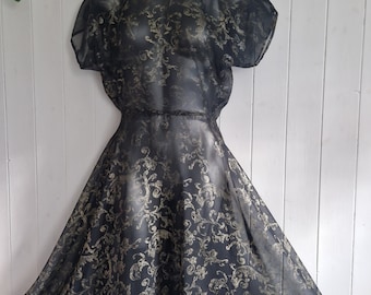 Homemade vintage dress in black and gold foil motif sheer organza fabric, full skirt, high neck dropped shoulder design, unusual dress