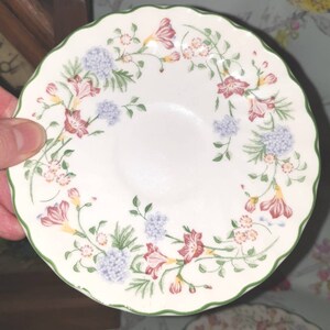Churchill saucer, in honeysuckle design, 80s 90s era, floral decorative saucer