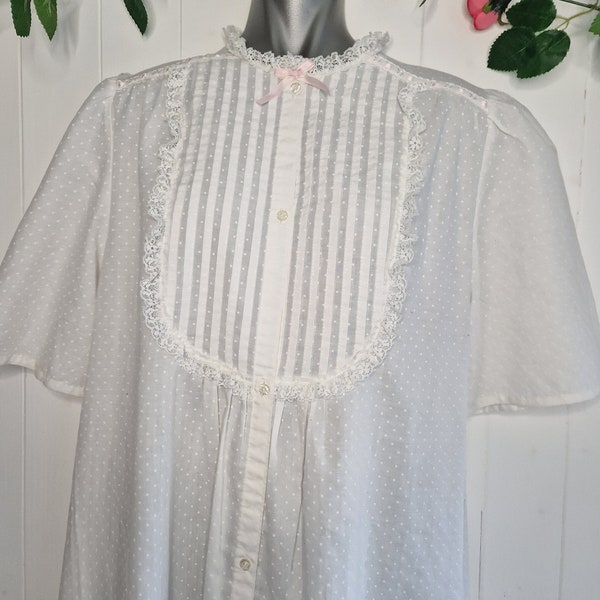 Pretty vintage nightgown by Secrets in polka dot with baby pink ribbon and lace, button up front, high neck and short sleeve, yolk detail