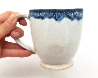Charming cream white cappucino cup