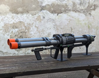 Lanzacohetes 3D Props (juguete equipado con una punta naranja)