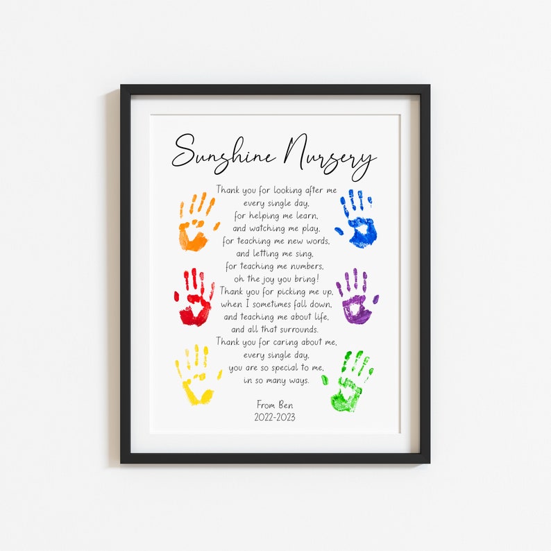 May include: A framed print with the words "Sunshine Nursery" and a poem, featuring colorful handprints. The poem expresses gratitude for care, learning, and joy. Signed "From Ben 2022-2023".