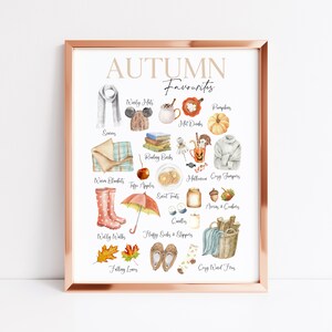 K&ouml;nnte beinhalten: Eine Aquarell-Illustration von Herbstfavoriten, darunter kuschelige Pullover, warme Decken, hei&szlig;e Getr&auml;nke, K&uuml;rbisse, fallende Bl&auml;tter und mehr. Der Text "AUTUMN Favourites" befindet sich oben auf der Illustration.