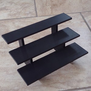 10-inch Black 3-Tier Riser Display Stand Shelf Figurine and Collectible Pops! Can Be Butted Up Against Each Other To Make Bigger Displays