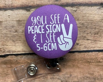 You See a Peace Sign Badge