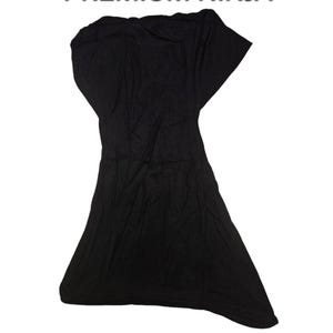 May include: A black, stretchy, fabric ninja head covering. The fabric is smooth and has a slight sheen. The head covering is designed to fit snugly over the head and neck. It is a popular choice for athletes, dancers, and anyone who wants to keep their hair out of their face.