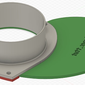 Puede incluir: Un puerto de recolección de polvo de plástico gris con una cubierta de recolección de polvo de plástico verde. La cubierta tiene el texto "http://xrz/wood" impreso en ella.