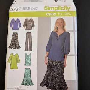 May include: Simplicity sewing pattern 2737, size BB, featuring a woman wearing a blue top and patterned skirt. The pattern includes illustrations of various tops, skirts, and pants. The text "easy-to-sew" is displayed prominently.