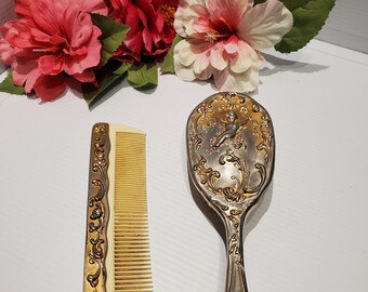 Vintage Heavy Silver Toned Cherub Brush Comb Set.