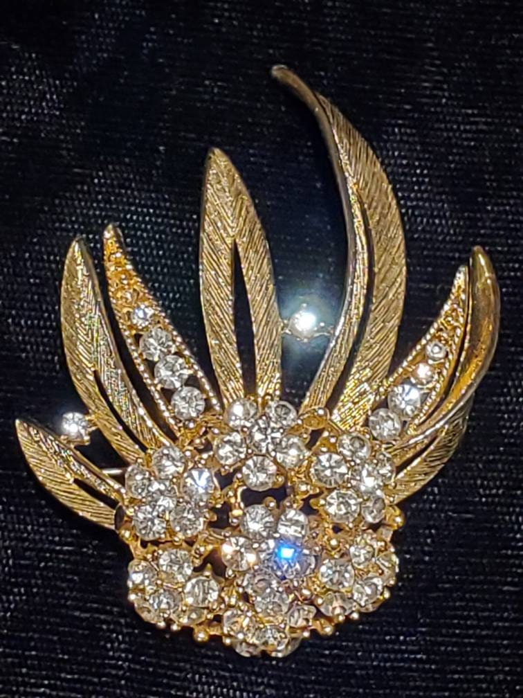 Gorgeous Gold Tone Metal Filigree Brooch With Clear