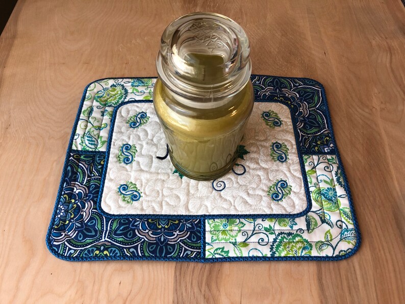 plants table d\u00e9cor Blue pet dishes teal and Green Paisley reversible mat for pans candles food