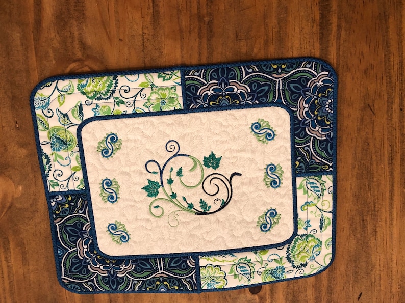 plants table d\u00e9cor Blue pet dishes teal and Green Paisley reversible mat for pans candles food