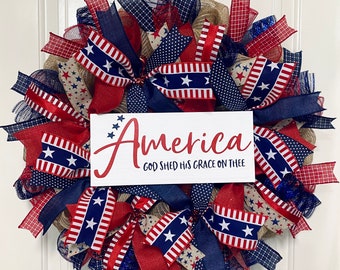 Patriotic front door wreath; deco mesh farmhouse wreath; America God she’s his grace on thee; Stars and Stripes