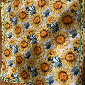 Manta almohada de girasol
