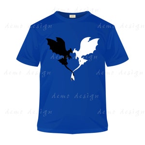 May include: A blue t-shirt with a black and white silhouette of two dragons facing each other. The dragons are in a heart shape.