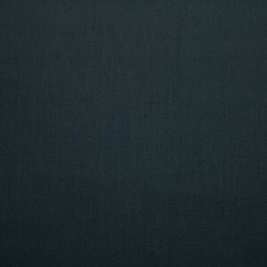 May include: A solid dark blue fabric with a subtle texture.